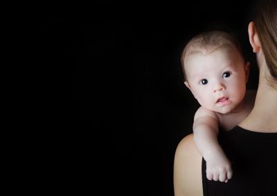 awake baby on shoulder