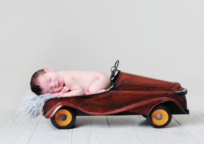 Newborn with Car Prop